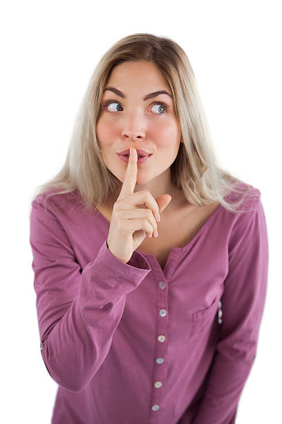 istock Woman saying to be quiet 497713575