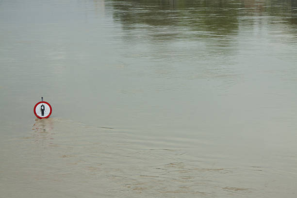 istock Flood, No Entry Sign over the Water 497715307