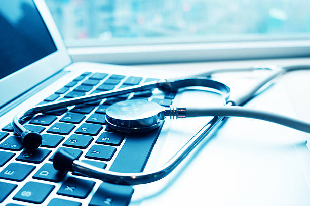 istock Stethescope on the keyboard of laptop 497739502