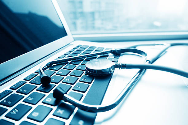 istock Stethescope on the keyboard of laptop 497739640
