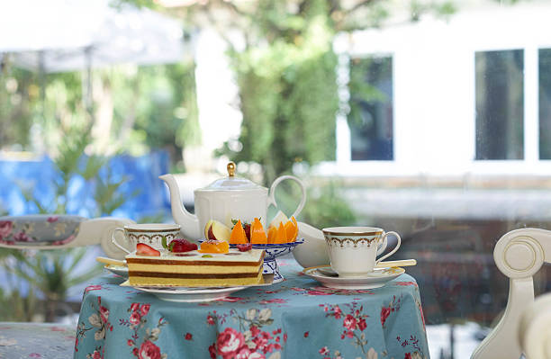 istock Homebakery cake and fresh fruit with English tea 497739836