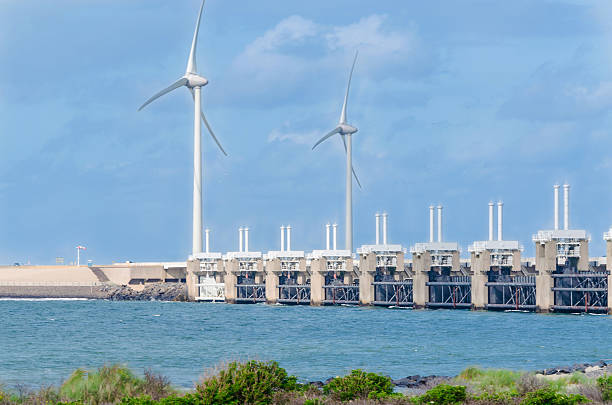 Wind turbine in the sea stock photo