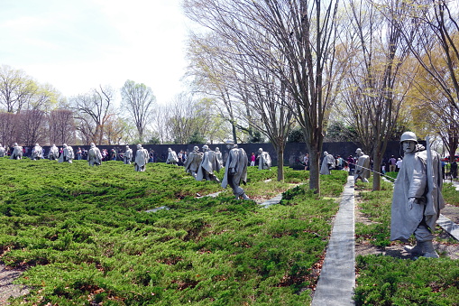 Washington DC, USA - April 12, 2015: People visiting the Korean War Memorial in Washington DC.