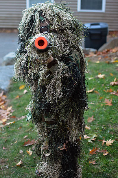 istock Sniper Kid In A Ghillie Suit For Halloween 497741486