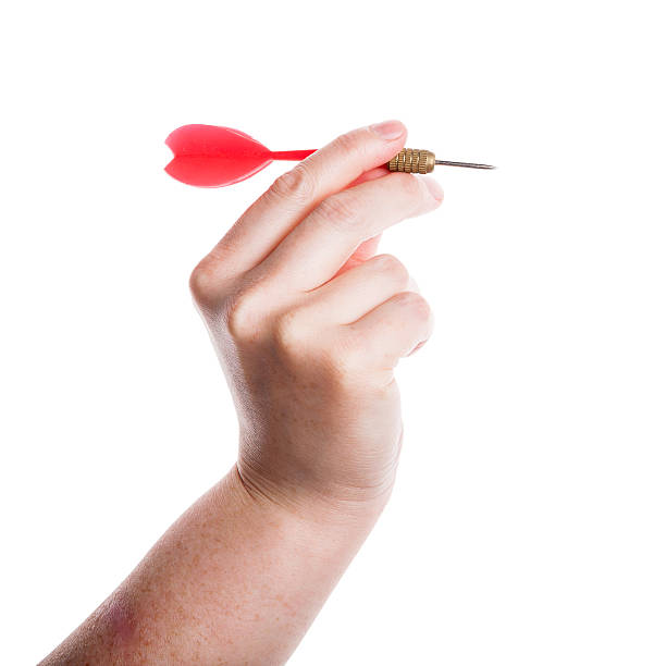 Female hand holding dart