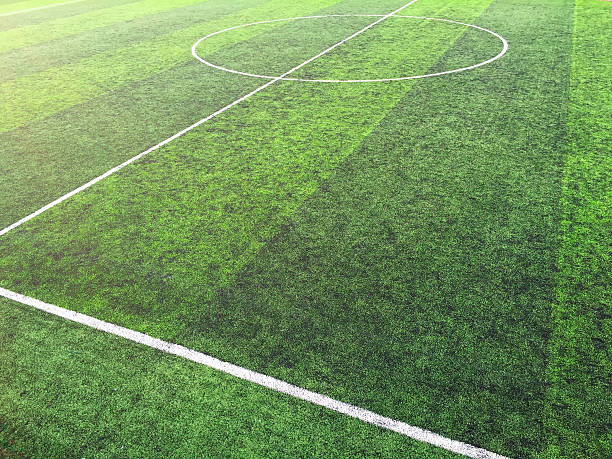 Green artificial turf football field