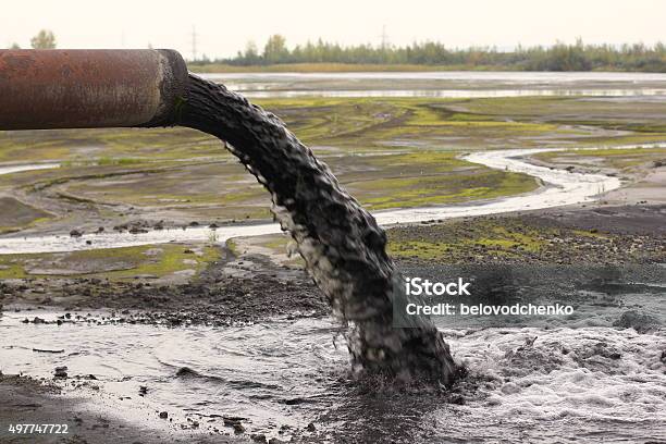 Industrial Pipe Discharging Liquid Waste Stock Photo - Download Image Now - Water Pollution, Water, Pollution