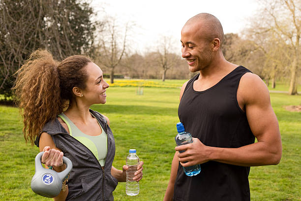 istock fitness couple in the park 497748208