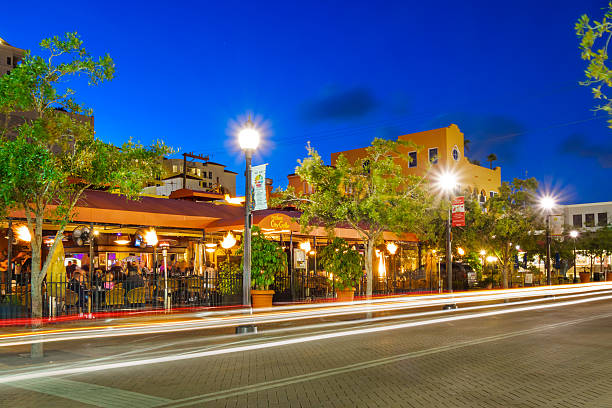 Miami Beach, FL, USA – December 28, 2014: Vacationers enjoy the night out while shopping at Lincoln Road Mall.