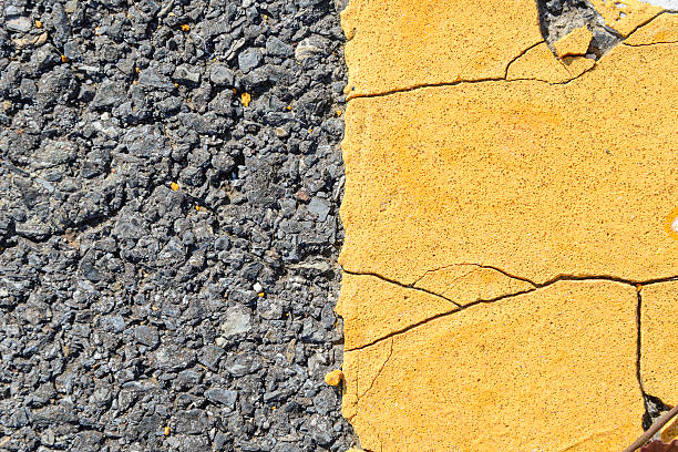 istock asphalt road with yellow strip 497749532