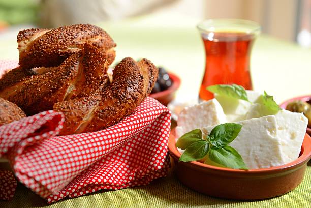 Simit Simit, cheese and Turkish tea. turkish bagel simit stock pictures, royalty-free photos & images