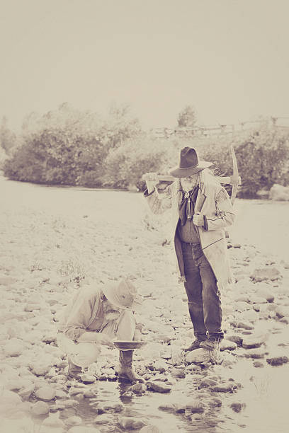 istock Vintage Prospectors Panning For Gold 497750901
