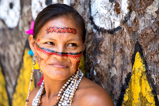 Native Brazilian woman portrait at an indigenous tribe in the Amazon