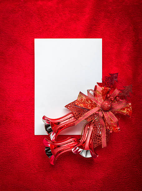 istock Christmas card blank white paper on red 497751334