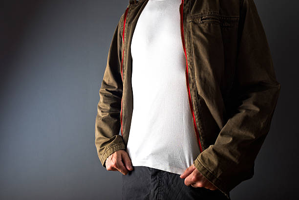 istock Man in showing white t shirt under his jacket 497751569