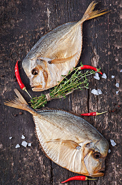 istock Vomer smoked fish on the wooden background 497752825
