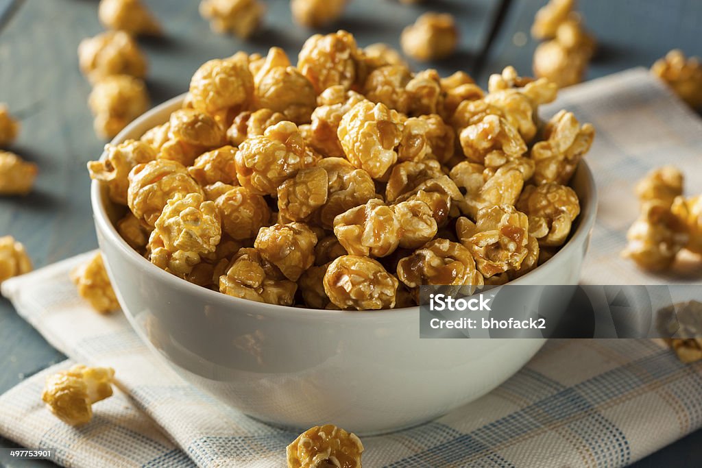 Homemade Golden Caramel Popcorn Homemade Golden Caramel Popcorn in a Bowl Popcorn Stock Photo