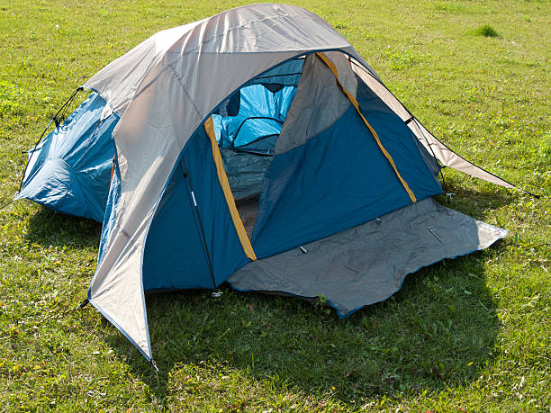 istock Camping tent on a grassland 497754225
