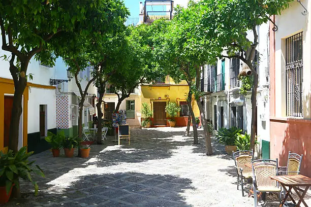 A little, pretty square in historical district of Santa Cruz in Sevilla.