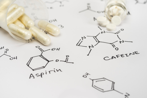 Aspirina caffein las cápsulas y los comprimidos de photo