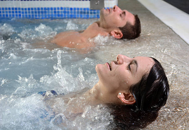 couple love in hot tub stock photo