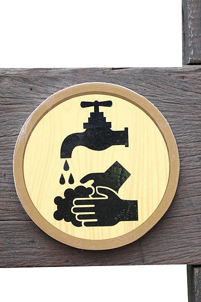 Signs of symbols indicates a clean hand on wood background.