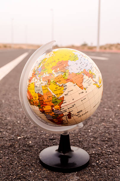 istock Globe Earth on an Asphalt Street 497778302