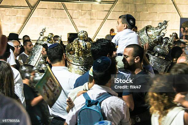 Men Dance With Bible Scrolls During Ceremony Of Simhath Torah Stock Photo - Download Image Now