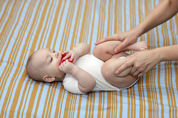 istock Mother exercises her baby 497781964