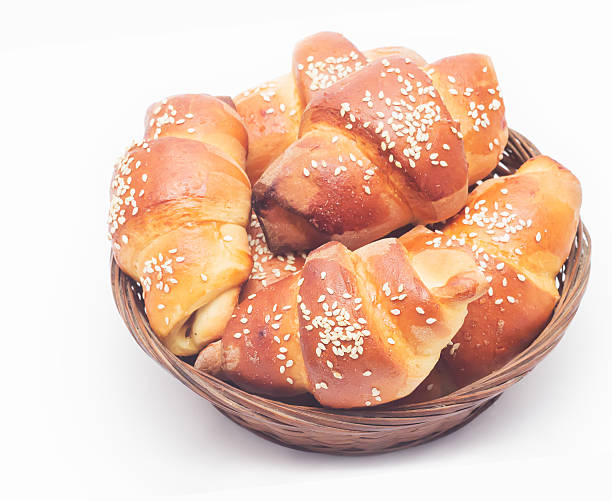 istock bun with sesame seeds in a wicker basket 497782308