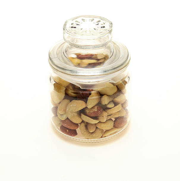 istock Various kind of nuts in a bottle 497785074