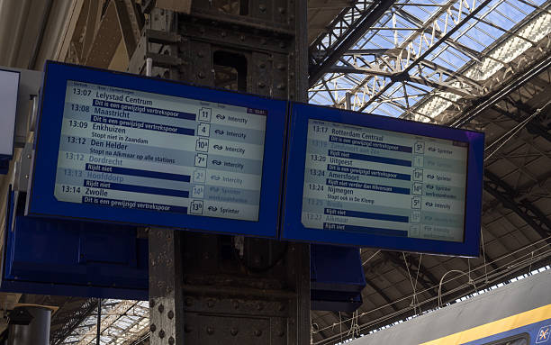 istock Timetable board in Amsterdam Railway Station 497787188