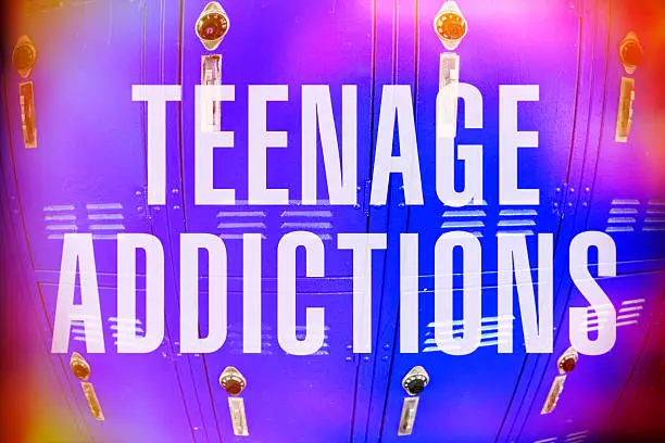 Text over lockers that say "Teen Addictions."