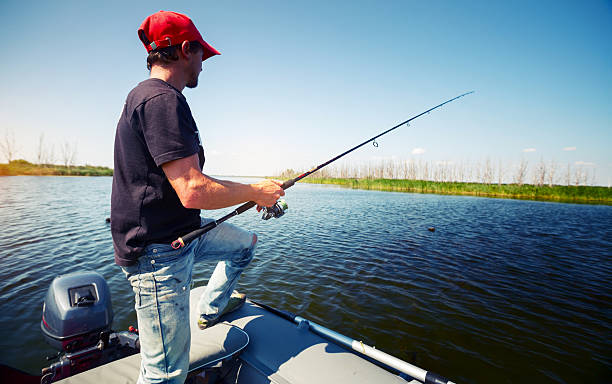 istock Fisherman in the boat 497787918