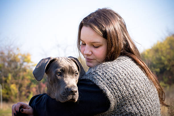 istock Girl and puppy 497789194