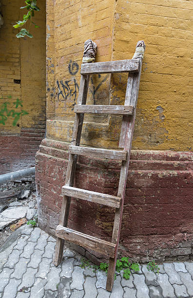 istock Old portable staircase in an abandoned yard. Vintage 497789878