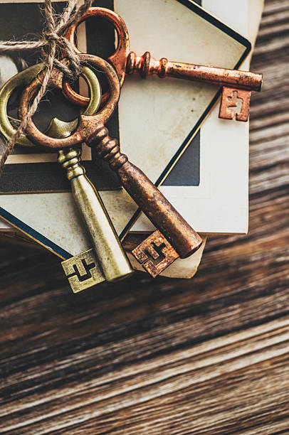 istock Nostalgic mementos. Old keys, diary and vintage photographs. 497791704