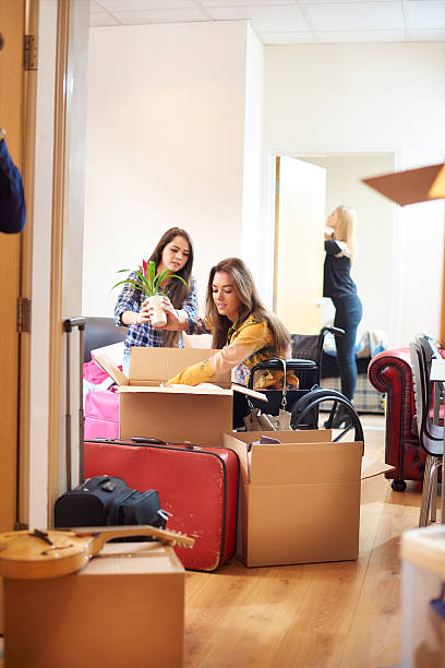 istock student housemates moving into halls 497792160