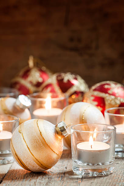 istock Christmas balls, burning candles 497793054