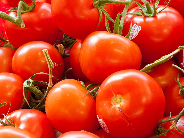 istock Tomatoes for sale at a market stall 497800307