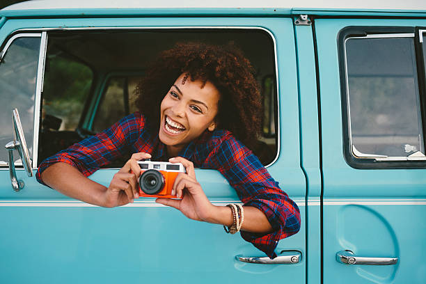 istock Girl with retro camera 497800831