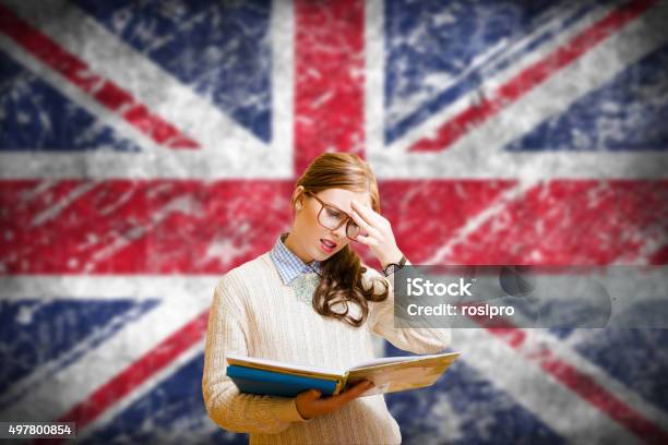 Student Girl On English Union Jack Blurred Background Stock Photo - Download Image Now