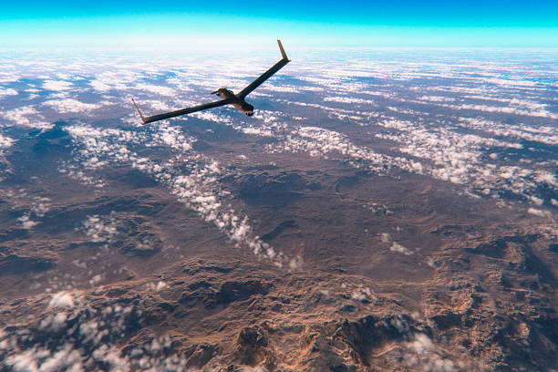 istock Military surveillance drone flying over rocky deserts 497800944