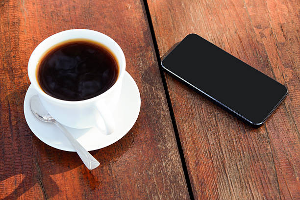 istock Smart Phone With Cup Of Coffee 497801816