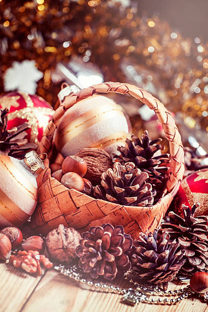 istock Wicker basket with fir cones, nuts, Christmas balls 497802010