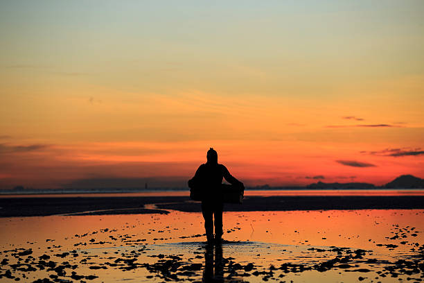 istock Fisherman in the moarning phuket thailand. 497802582