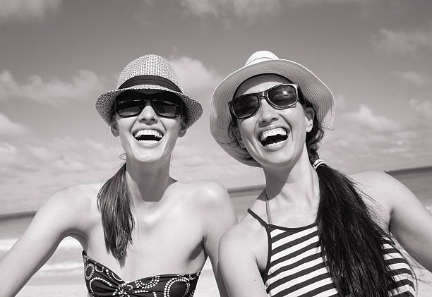 Pretty young girls having fun at the beach.