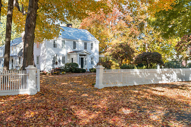 Historic Federal  Home Historic federal style home with a white picket fence in Deerfield, Massachusetts. colonial style stock pictures, royalty-free photos & images