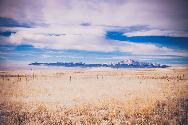 istock Colorado landscape with Pike's Peak surrounded by clouds 497807580