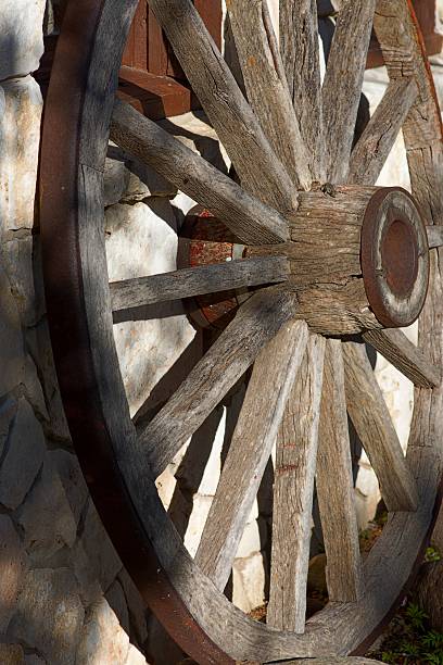 istock An Old wooden wagon wheel 497807822